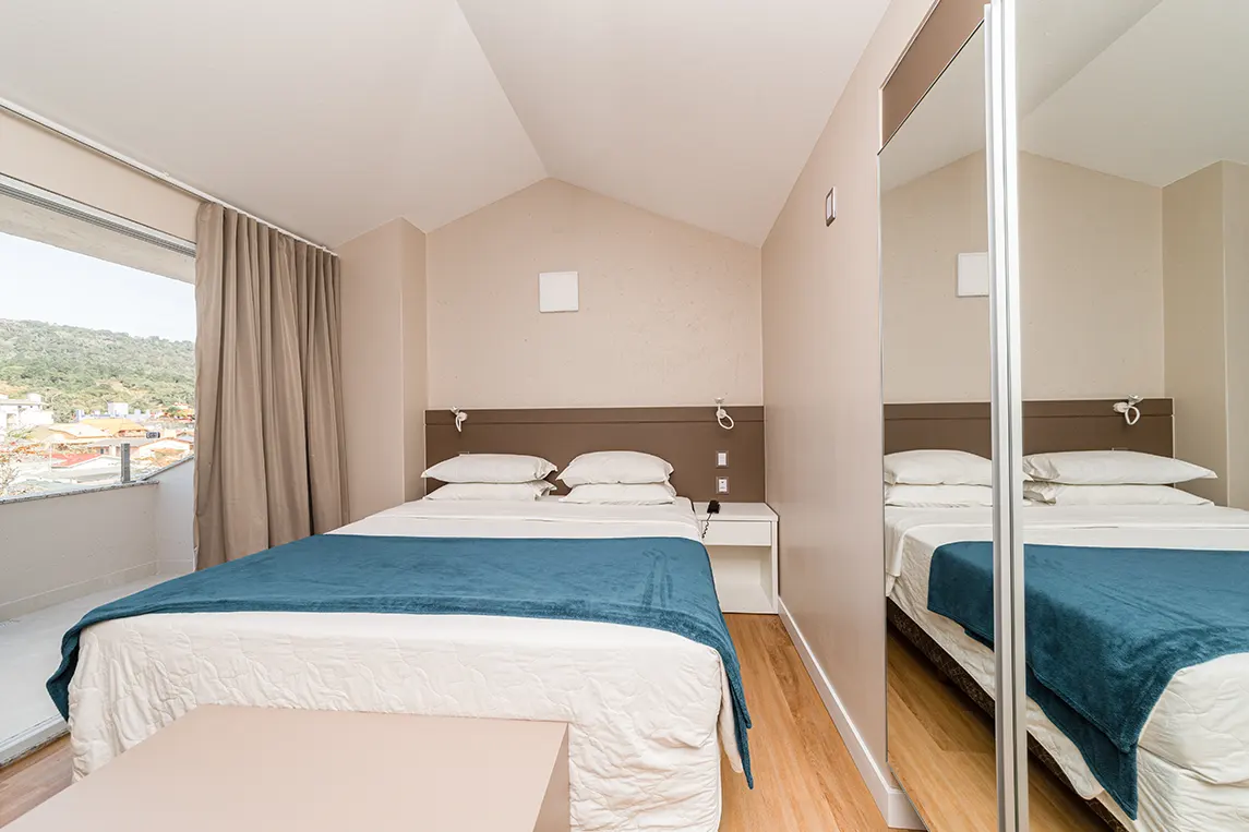 Cama de casal no apartamento luxo duplex da Pousada dos Sonhos em Jurerê, Florianópolis, Santa Catarina