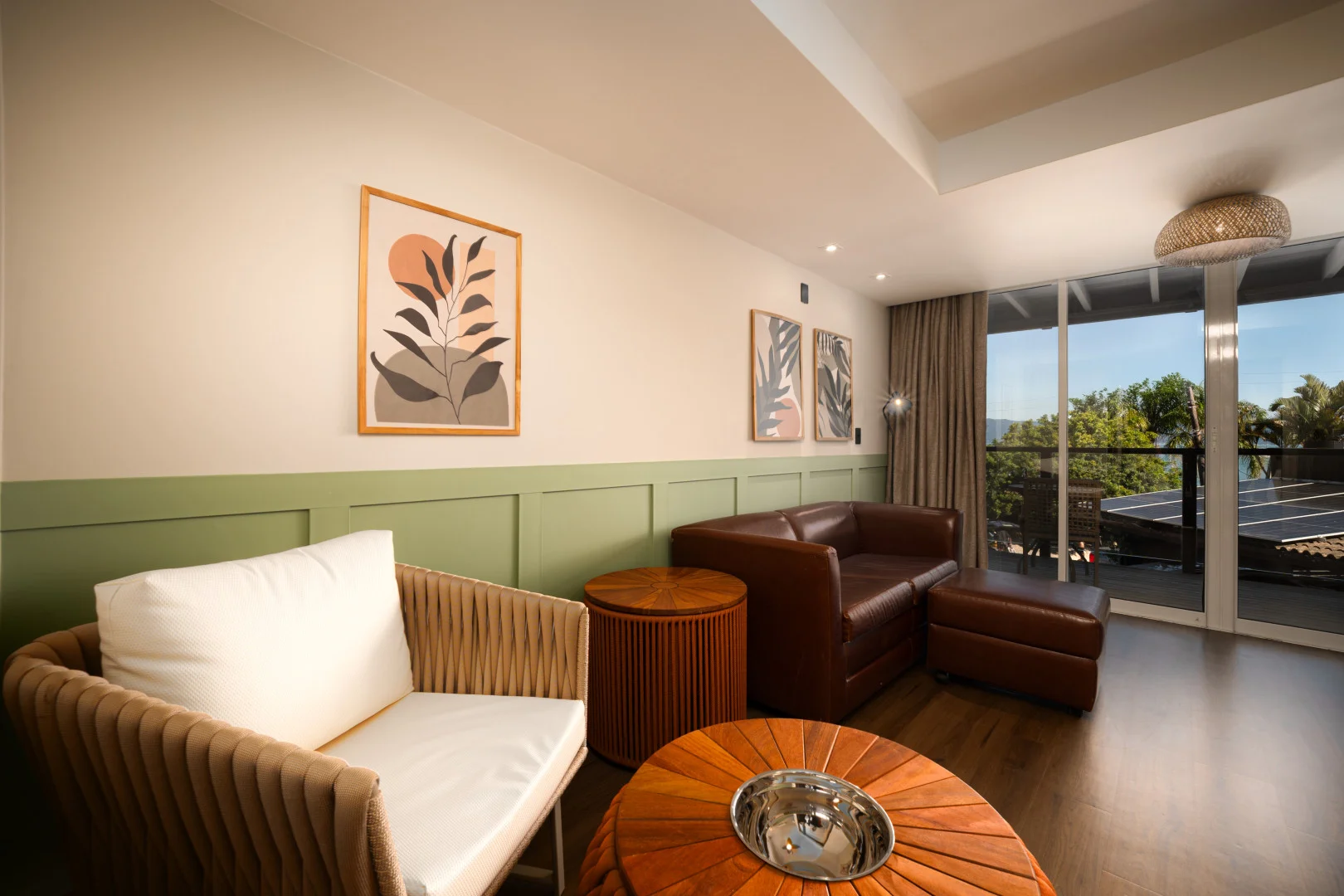 imagem dos sofás e sala do Apartamento 1 Quarto Luxo da Pousada dos Sonhos